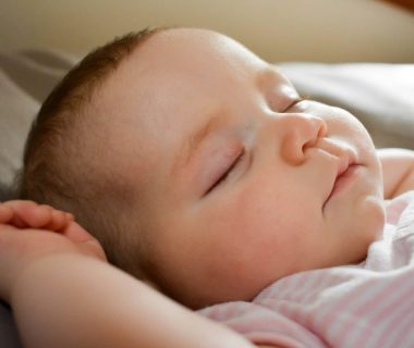 Why Do Babies Sleep with Arms Up